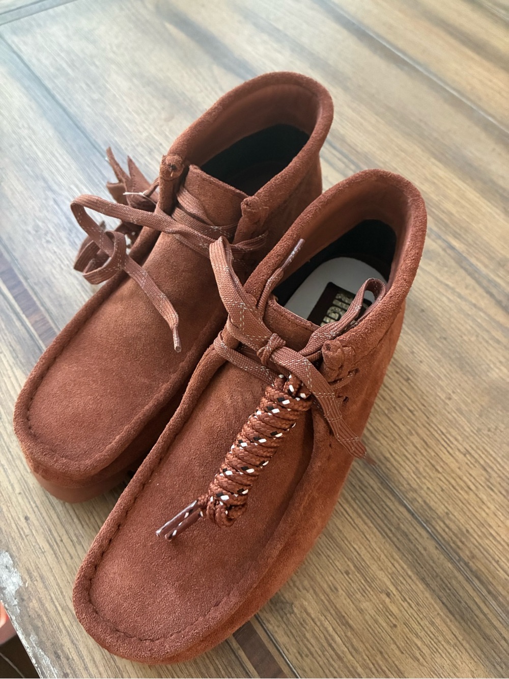 Clark’s women’s size 5.5 Suede Moccasin Boots in Rust Brown